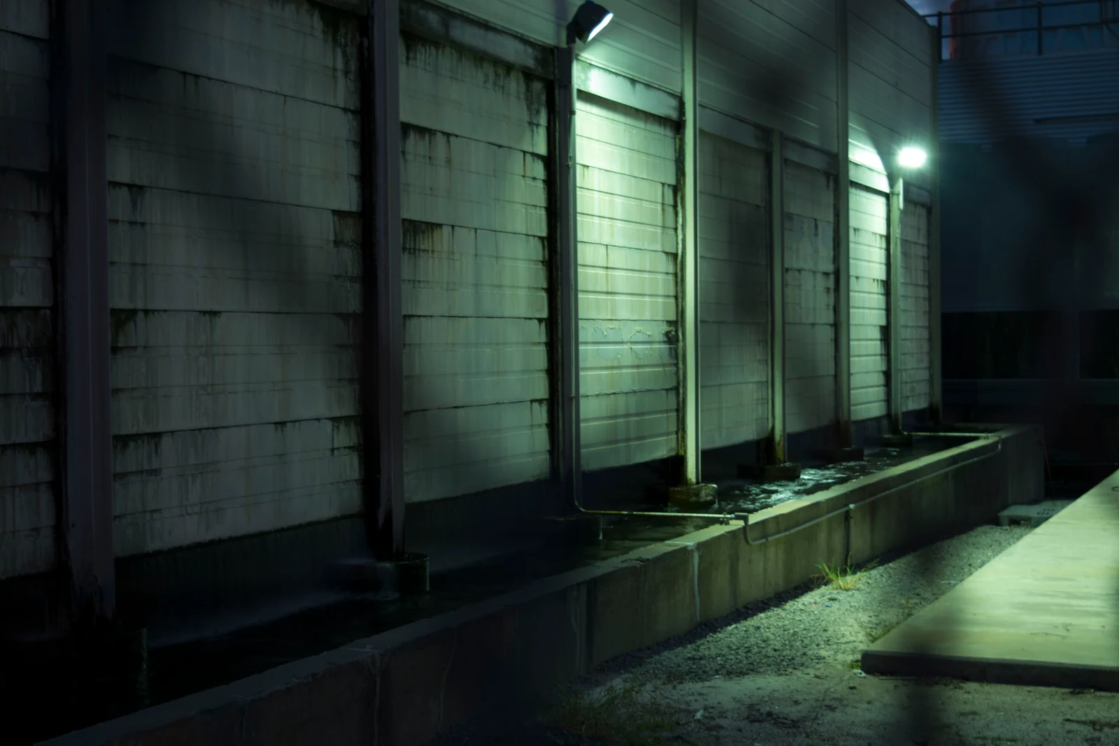 An industrial loading dock illuminated at night