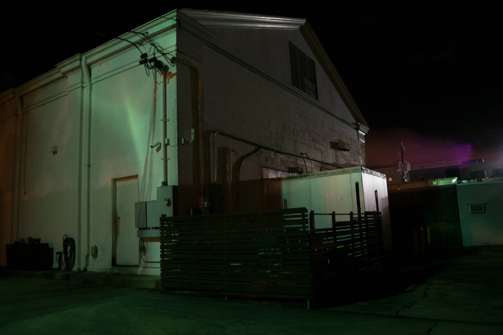 A warehouse beneath the night sky
